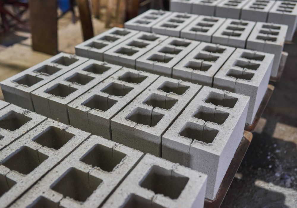 Cinder blocks lie on the ground and dried. on cinder block production plant